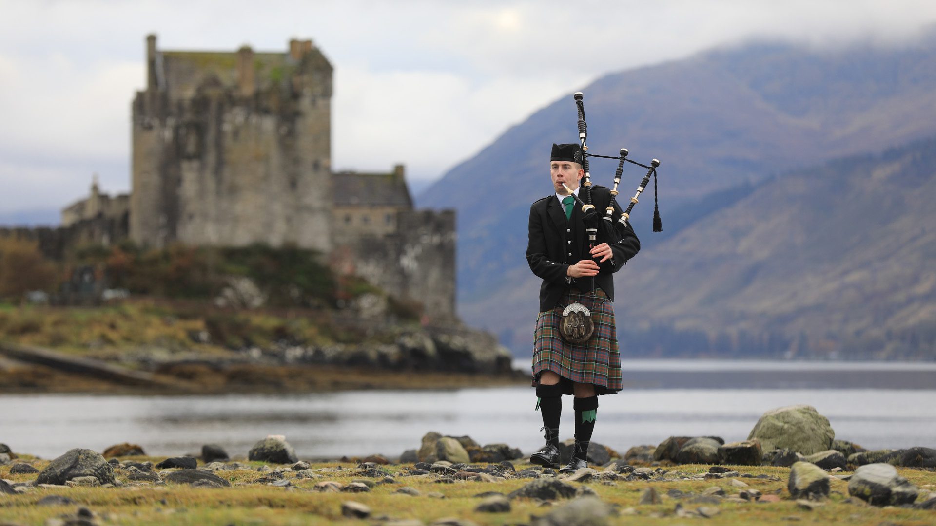 Piper at Eilean Donan Castle